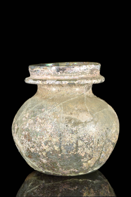 ROMAN PALE GREEN GLASS VESSEL

 Ca. AD 100 - 300 A Roman pale green glass vess...