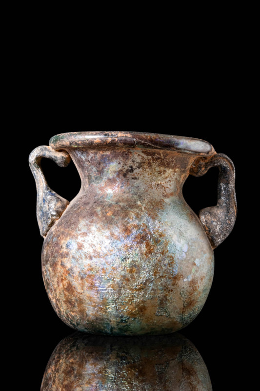 LATE ROMAN BLUE GLASS AMPHORISKOS WITH TWO HANDLES

 Ca. AD 300 - 500 A Roman ...