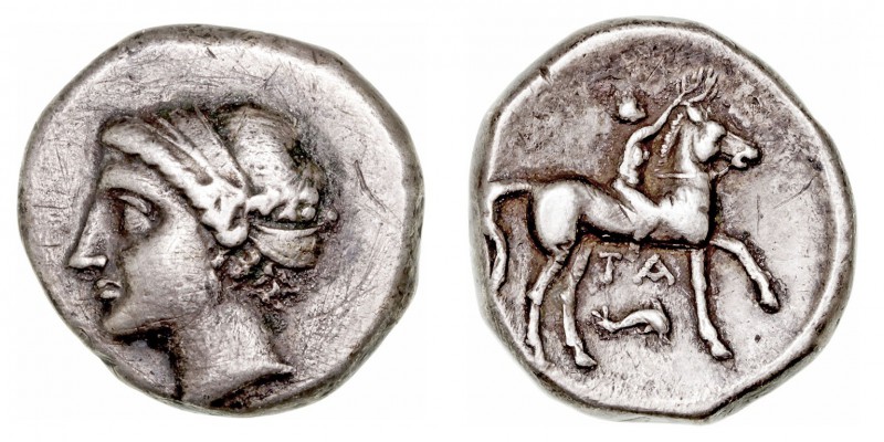 Monedas Antiguas
Calabria
Estátera. AR. Tarento. (302-281 a.C.). A/Cabeza diad...