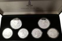 Monedas Extranjeras
Rusia 
AR. 1977. Olimpiada de Moscú 1980. Estuche de 6 monedas. 5 Rublos (4) y 10 Rublos (2). En estuche original y con certific...