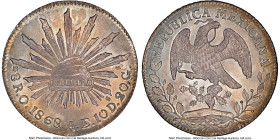 Republic 8 Reales 1868 O-AE MS65 NGC, Oaxaca mint, KM377.11, DP-Oa16 (Scarce). Ornate 6 variety. The scarcer variety of the type and a superlative exa...