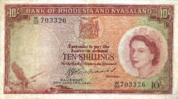 CARTAMONETA ESTERA - RHODESIA & NYASALAND - Elisabetta II (1952-1966) - 10 Scellini 30/01/1961 Pick 20 R   Stirato