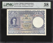 CEYLON. Government of Ceylon. 10 Rupees, 1.2.1941. P-33. PMG Choice About Uncirculated 58.
Serial number J/2 771182. Sole finest in the PMG populatio...