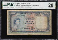 CEYLON. Lot of (2). Central Bank of Ceylon. 50 & 100 Rupees, 3.6.1952. P-52 & 53a. PMG Very Fine 20 & 30.
One of the earliest types issued after Quee...