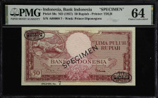 INDONESIA. Bank Indonesia. 50 Rupiah, ND (1957). P-50s. Specimen. PMG Choice Uncirculated 64.
Serial number A00000. Maroon, crocodile at left. One no...