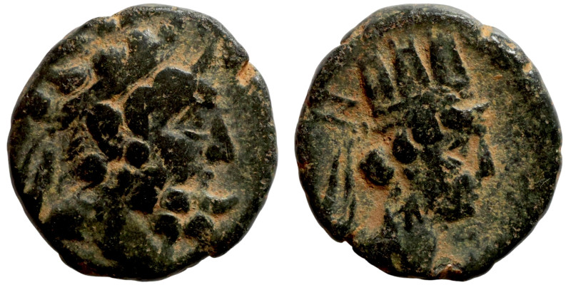 Greek. Unattributable, no legends present on coin. Obv.: Head of Zeus. Rev.: tur...