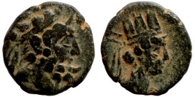 Greek. Unattributable, no legends present on coin. Obv.: Head of Zeus. Rev.: turreted Tyche w. flowing veil. Lindgren III #1633.