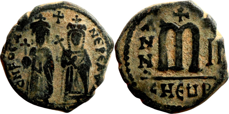 Phocas and Leontia.(602-610). Follis. . Obverse: Standing Phocas and Leonita Rev...