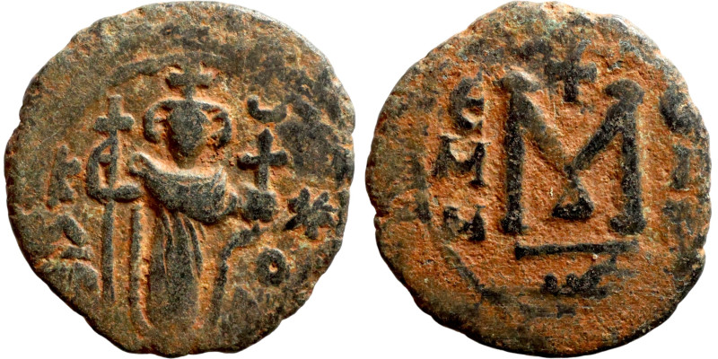 Constans II (641-668) Follis. Obverse: Imperial figure holding cross and globus ...