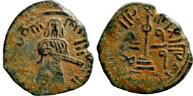 Al-Malik. Follis. Obverse: Imperial figure. Reverse: Modified cross potent set on steps