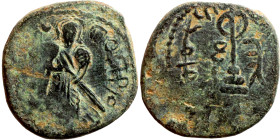 Al-Malik. Follis. Obverse: Imperial figure. Reverse: Modified cross potent set on steps