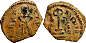 Al-Malik. Follis. Obverse: Imperial figure. Reverse: Modified cross potent set on steps