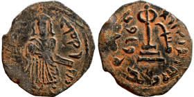 Al-Malik. Follis. Obverse: Imperial figure. Reverse: Modified cross potent set on steps