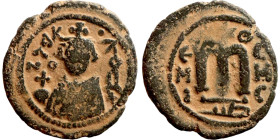 Al-Malik. Follis. Obverse: Imperial figure. Reverse: Modified M