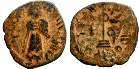 Al-Malik. Follis. Obverse: Imperial figure. Reverse: Modified cross potent set on steps