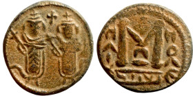 Al-Malik. Follis. Obverse: two Imperial figures. Reverse: Modified M