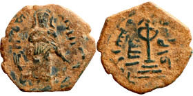 Al-Malik. Follis. Obverse: Imperial figure. Reverse: Modified cross potent set on steps