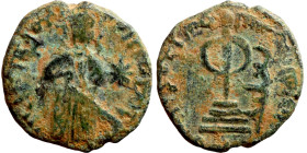 Al-Malik. Follis. Obverse: Imperial figure. Reverse: Modified cross potent set on steps