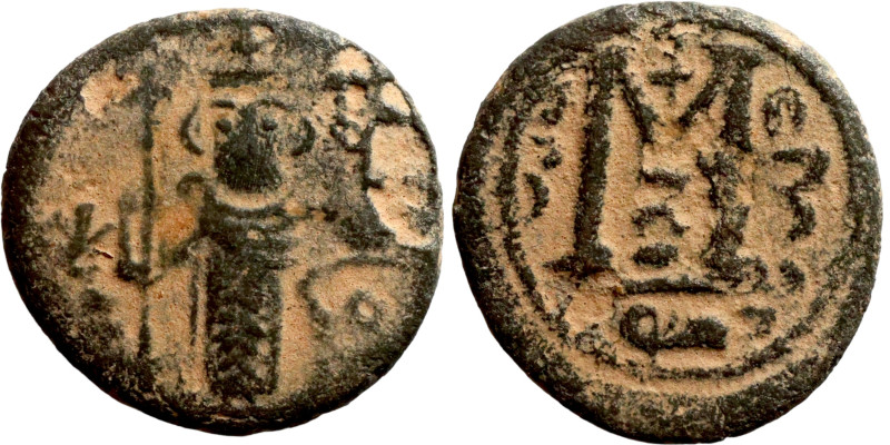 Al-Malik. Follis. Obverse: Imperial figure. Reverse: Modified M

15mm 2,67g