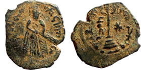 Al-Malik. Follis. Obverse: Imperial figure. Reverse: Modified cross potent set on steps