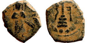 Al-Malik. Follis. Obverse: Imperial figure. Reverse: Modified cross potent set on steps