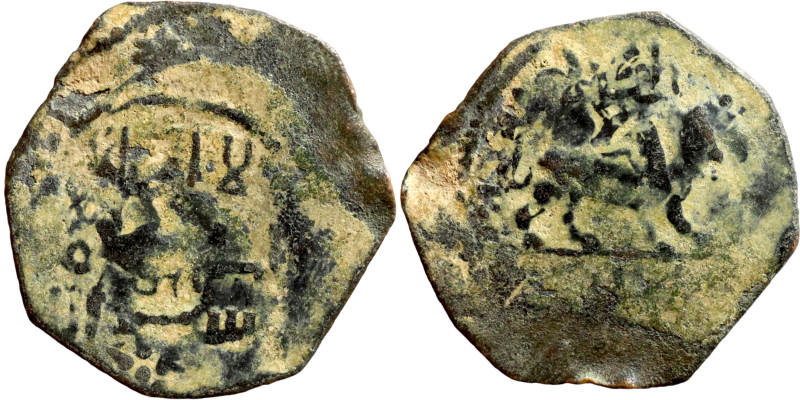 Seljuq (1037–1157) Bronze coin. Obverse: Horseman Arabic inscription. Reverse: A...