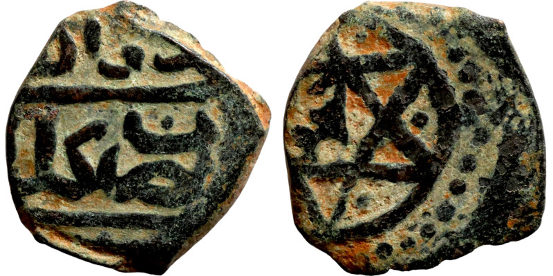 Maroco, Bronze coin. Obverse: Star. Reverse: Arabic inscription

15mm 1,88g