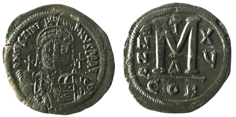 JUSTINIAN I (527-565). Follis.
Obv: D N IVSTINIANVS P P AVG.
Helmeted and cuir...