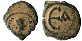 Maurice Tiberius (AD 582-602). Constantinople
AE Pentanummium (17mm, 1,48g)

Artificial sandpatina