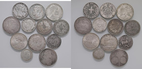 WORLD COINS Lotto da 12 monete d'argento.