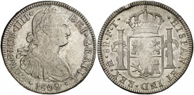 1802. Carlos IV. México. FT. 8 reales. (Cal. 698). 26,94 g. Golpecito en canto. MBC-/MBC.