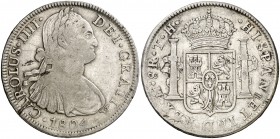 1804. Carlos IV. México. TH. 8 reales. (Cal. 701). 26,72 g. Rayas en reverso. BC+/MBC-.