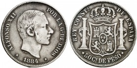 1884. Alfonso XII. Manila. 50 céntimos. (Cal. 84). 12,85 g. MBC.