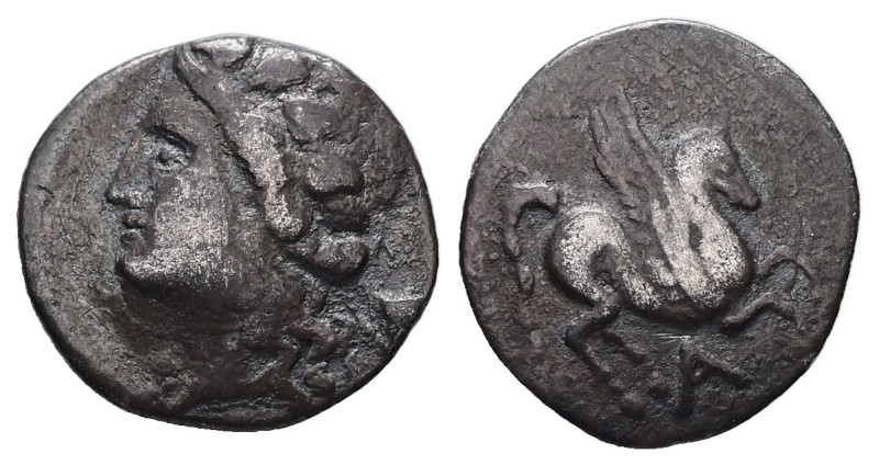 Epeiros, Ambrakia. AR Drachm, 1.54 g 13.90 mm. After circa 210 BC. 
Obv: Wreathe...