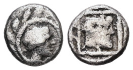 Kyrenaika, Kyrene AR Trihemiobol, 0.81 g 9.21 mm. Circa 480-435. 
Obv: Female head right, within circular linear border; all within wreath 
Rev: Head ...