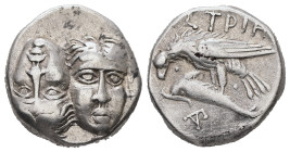 Moesia, Istros. AR Drachm, 5.56 g 17.20 mm. 4th century BC.
Obv: Facing male heads, the left inverted.
Rev: ΙΣΤΡΙΗ. Sea eagle right, grasping dolphi...