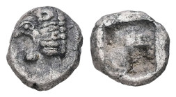 Thraco-Macedonian Region, Uncertain. AR Hemiobol, 0.45 g. - 7.36 mm. Circa 520-470 BC.
Obv.: Head of roaring lion left with open jaws and protruding t...