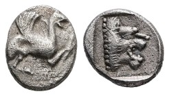 Troas, Assos. AR, Obol. 0.61 g. - 9.00 mm. 5th century BC.
Obv.: Griffin seated right.
Rev.: Lion's head right within incuse square.
Ref.: Weber 53...