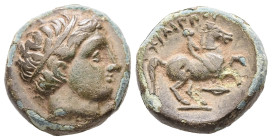 Kings of Macedon. Philip II. Ae, 6.23 g 17.21 mm. 359-336 BC.
Obv: Diademed head of Apollo right.
Rev: ΦIΛIΠΠOY, Youth on horseback right. spear-head ...