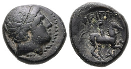 Kings of Macedon, Philip II. Ae, 7.02 g 18.49 mm. 359-336 BC. Uncertain mint.
Obv: Diademed head of Apollo right 
Rev: ΦIΛIΠΠOY, naked youth on horse ...