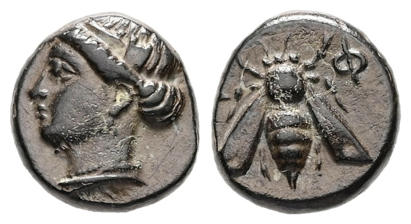 Ionia, Ephesos. Ae. 1.42 g. - 10.58 mm. Circa 375-325 BC.
Obv.: Female head left...