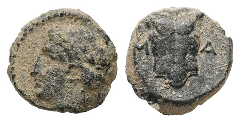 Ionia, Magnesia ad Maeandrum. Ae, 0.65 g 8.77 mm. Circa 400 BC
Obv: Laureate hea...