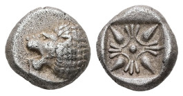 Ionia, Miletos. AR Obol or Hemihekte, 1.17 g 9.40 mm. Late 6th-early 5th centuries BC.
Obv: Forepart of lion right, head left.
Rev: Stellate floral de...
