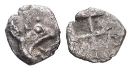 Ionia, Teos. AR Tetartemorion, 0.16 g 7.00 mm. Circa 475-450 BC.
Obv: Head of griffin right.
Rev: Quadripartite incuse square.
Ref: SNG Kayhan 603....