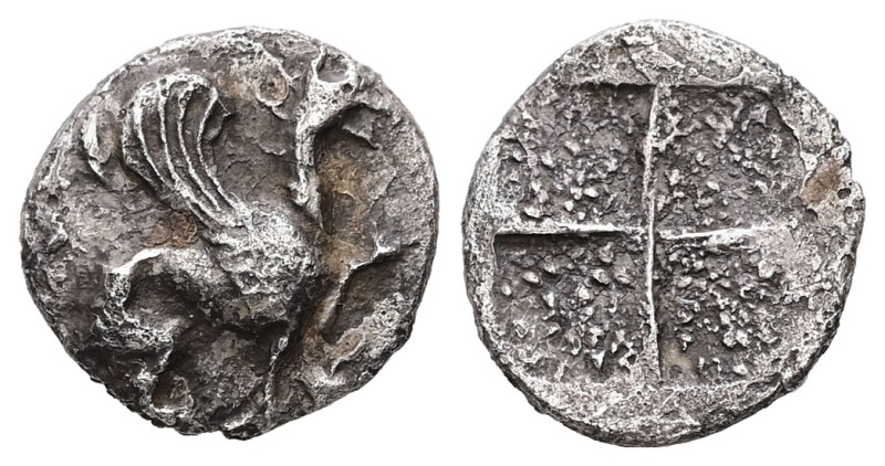 Ionia, Teos. AR Diobol, 1.13 g 11.69 mm. Circa 510-490 BC.
Obv: Griffin seated r...