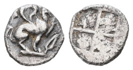 Ionia, Teos. AR Hemiobol, 0.32 g 8.23 mm. Circa 460-420 BC. 
Obv: Griffin seated to right, left paw raised; [T behind], olive leaf before 
Rev: Quadri...