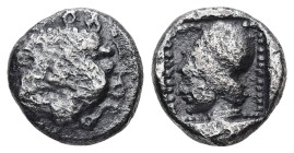 Lesbos, Methymna. AR Diobol, 1.21 g 10.45 mm. Circa 500-460 BC.
Obv: Facing head of gorgoneion with protruding tongue 
Rev: Helmeted head of Athena le...