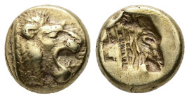 Lesbos, Mytilene. EL Hekte, 2.54 g 10.62 mm. Circa 521-478 BC.
Obv: Head of roaring lion right.
Rev: Incuse head of calf right; rectangular punch to l...