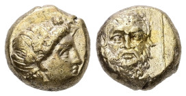 Lesbos, Mytilene. EL Hekte, 2.54 g 9.94 mm. Circa 377-326 BC. 
Obv: Wreathed head of Dionysos right 
Rev: Head of satyr facing, with full head of hair...