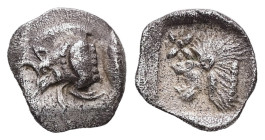 Mysia, Kyzikos. AR, Hemiobol. 0.38 g. - 9.28 mm. Circa 450-400 BC.
Obv.: Forepart of boar left; to right, tunny upward.
Rev.: Head of roaring lion lef...